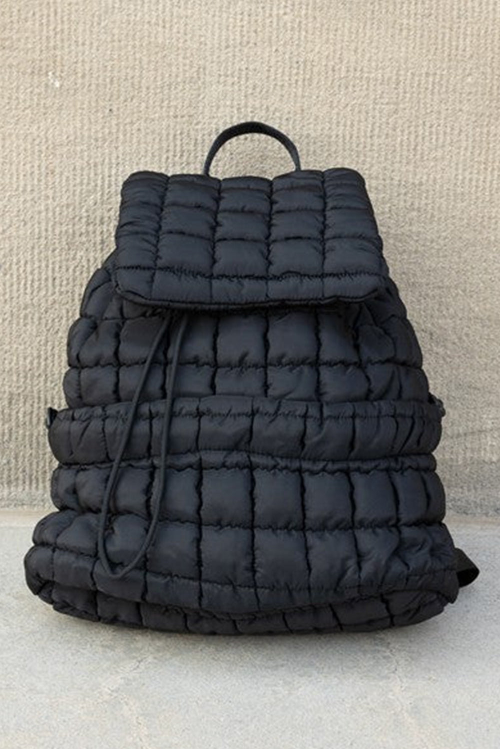 Black Solid Flapped Quilted Puffer Backpack